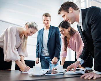 business women and men working together