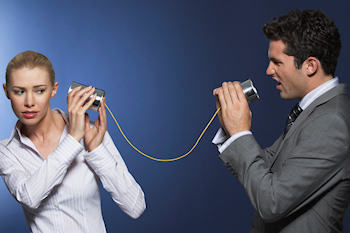 Man yelling through a can at a woman